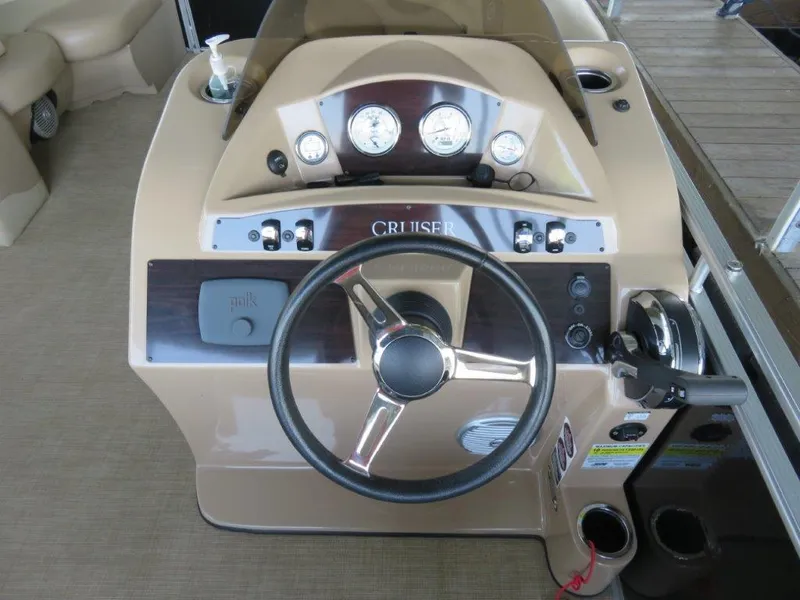 Slide: The Image of Steering console of 2016 Harris FloteBote Cruisers CX200 with gauges and controls. - 5