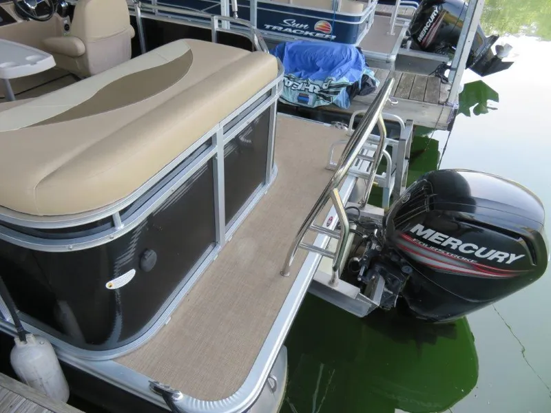 Slide: The Image of 2016 Harris FloteBote Cruisers CX200 with Mercury outboard motor at dock. - 6