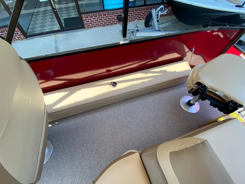 Slide: The Image of Interior of 2023 Veranda Fish VF20F4 boat with beige seats and red side panel. - 10