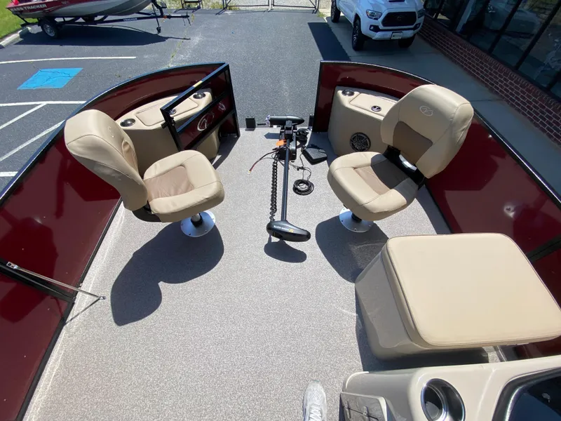 Slide: The Image of 2023 Veranda Fish VF20F4 boat interior with beige seats and fishing equipment. - 15