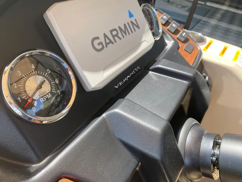 Slide: The Image of Close-up of 2023 Veranda Fish VF20F4 boat dashboard with Garmin display. - 18