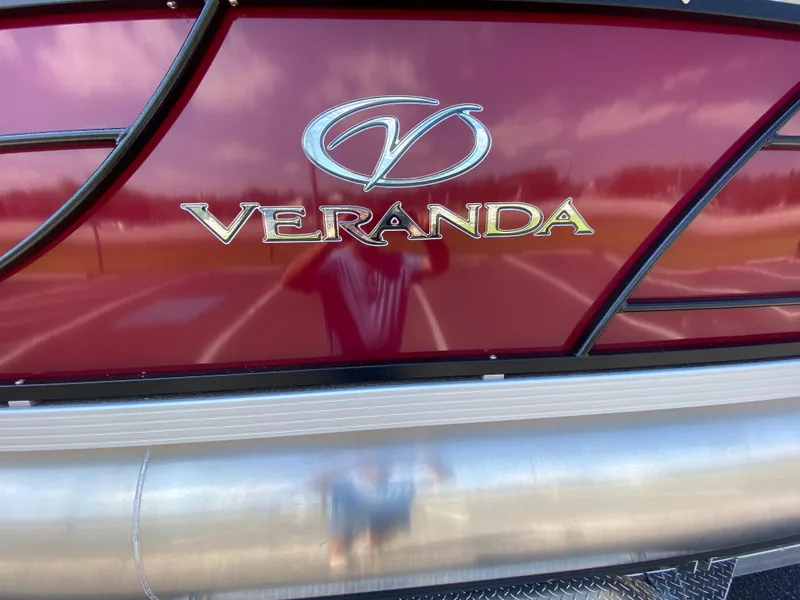 Slide: The Image of 2023 Veranda Fish VF20F4 boat, close-up of logo on red exterior. - 20