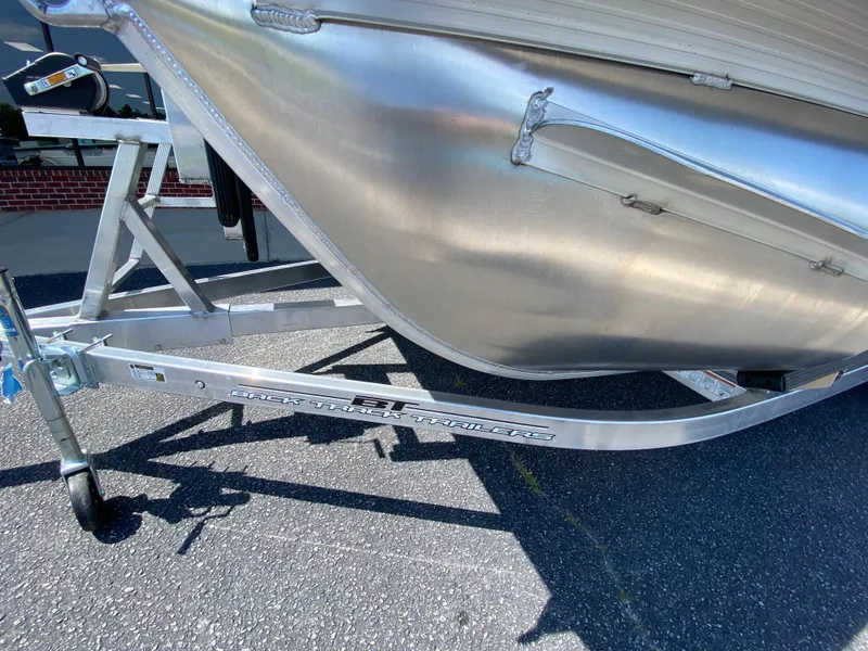 Slide: The Image of 2023 Veranda Fish VF20F4 boat on a trailer, close-up view of the hull and frame. - 23