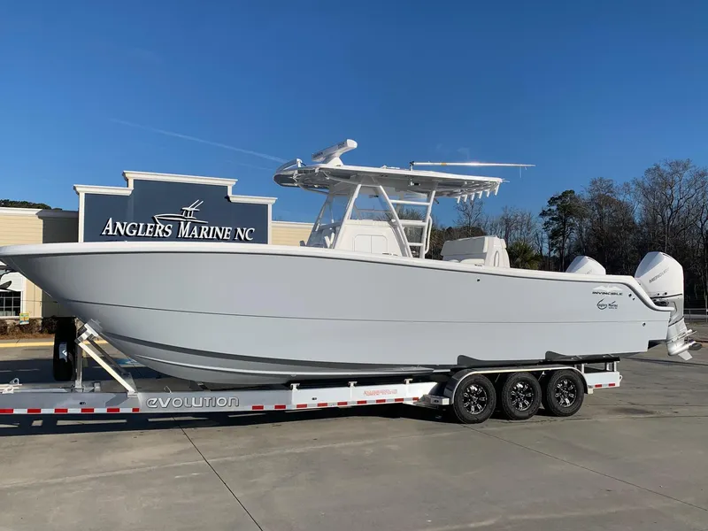 Slide: The Image of 2024 Invincible 33 Catamaran at Anglers Marine NC on trailer. - 0