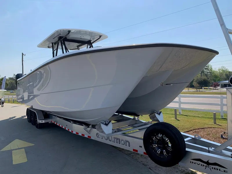 Slide: The Image of 2024 Invincible 35 Catamaran on trailer, side view. - 2