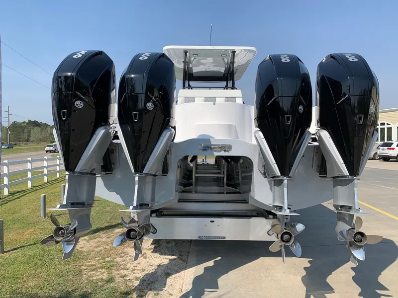 Slide: The Image of 2024 Invincible 35 Catamaran with four powerful outboard engines. - 3