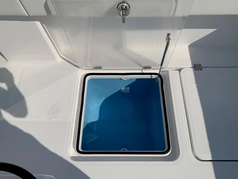 Slide: The Image of 2024 Invincible 35 Catamaran livewell with open lid. - 7