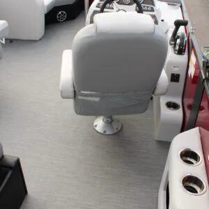 Slide: The Image of 2023 Lowe SS210 W Super Sport boat interior with captain's chair and control console. - 12