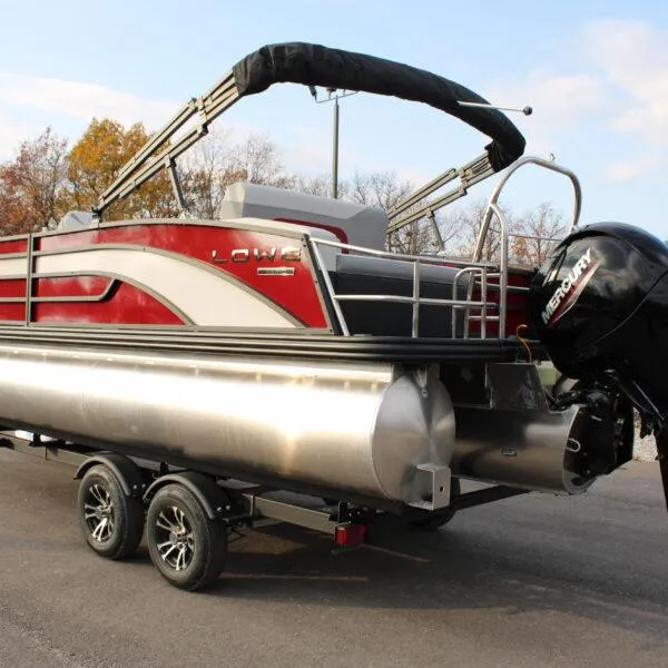 Slide: The Image of 2023 Lowe SS210 W Super Sport pontoon boat on trailer with Mercury outboard motor. - 4