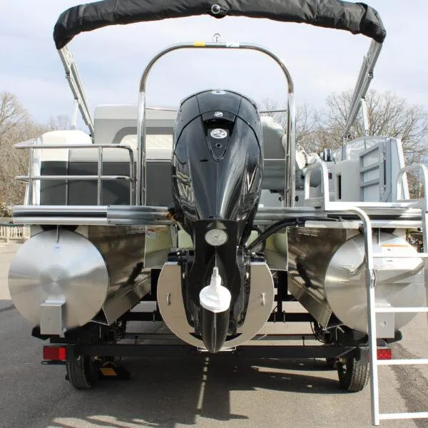 Slide: The Image of 2023 Lowe SS210 W Super Sport pontoon boat rear view with outboard motor. - 3