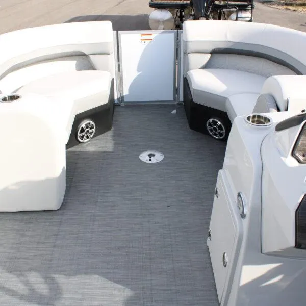 Slide: The Image of 2023 Lowe SS210 W Super Sport boat interior with seating and speakers. - 4