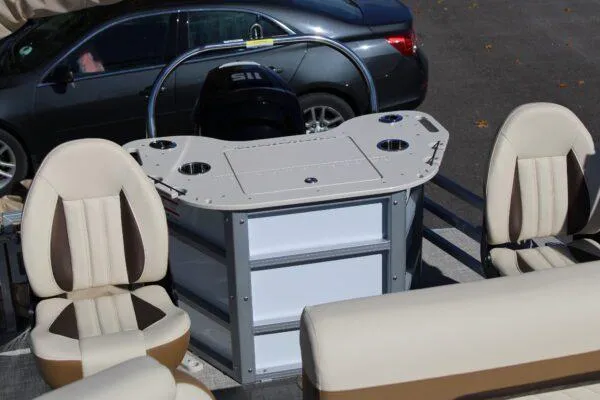 Slide: The Image of 2023 Lowe SF214 boat interior with seating and control console. - 4