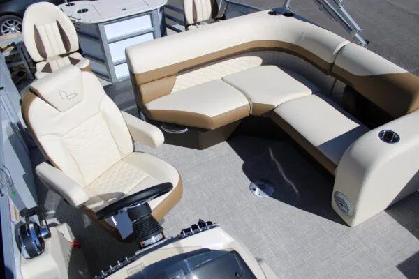 Slide: The Image of 2023 Lowe SF214 boat interior with beige and brown seating. - 5
