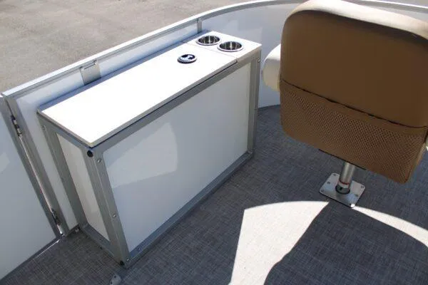 Slide: The Image of 2023 Lowe SF214 boat interior with beige seat and white storage unit. - 6