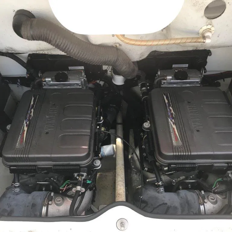 Slide: The Image of Twin engines of a 2007 Yamaha Boats AR230 HO, showcasing detailed components. - 10