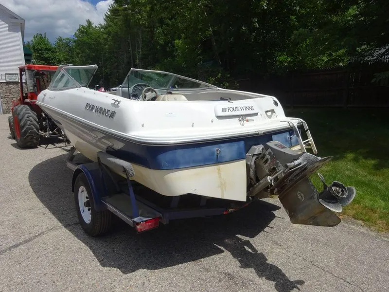 Slide: The Image of 2000 Four Winns 180 Horizon boat on trailer, rear view. - 6