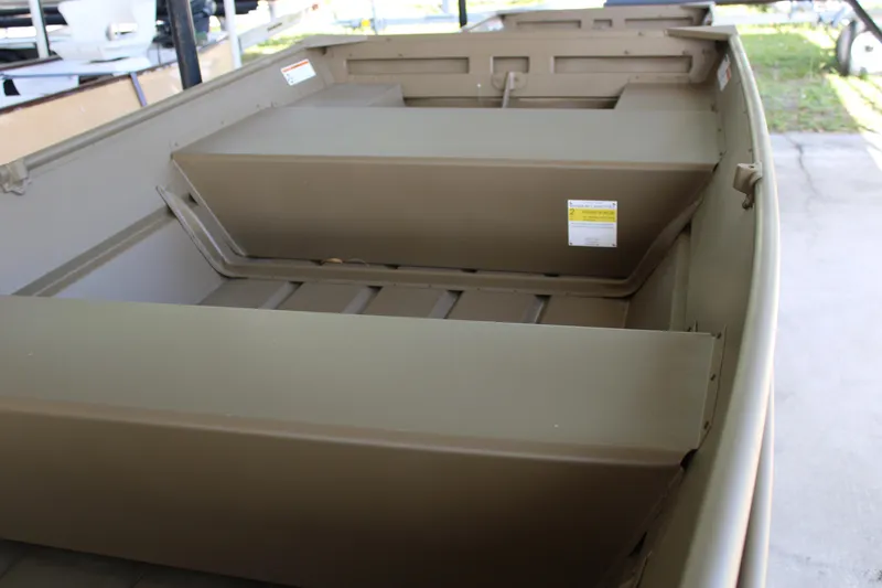 Slide: The Image of 2024 G3 Gator Tough 1436 boat interior, featuring durable seating and storage compartments. - 3