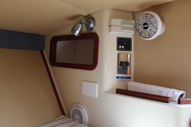 Slide: The Image of Interior of 2010 Chris-Craft Corsair 28 boat cabin. - 17