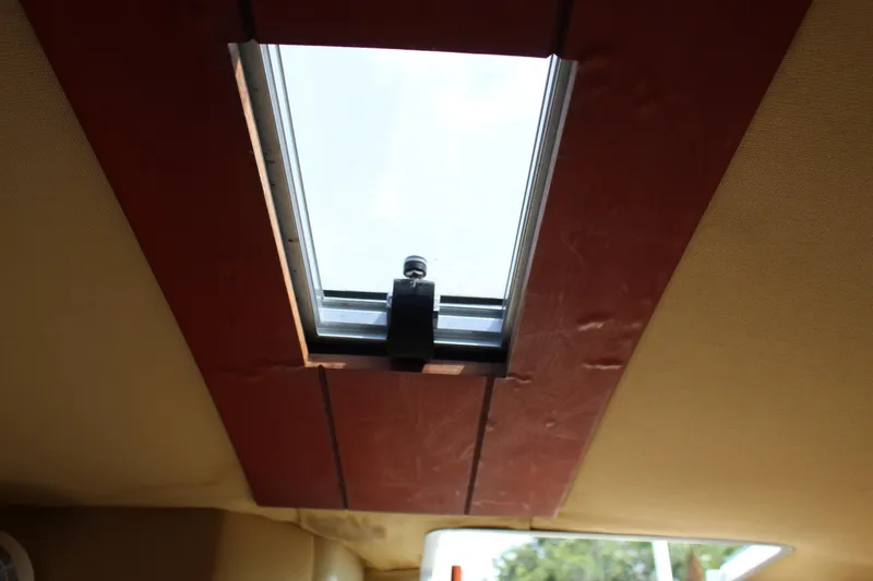 Slide: The Image of Sunroof of a 2010 Chris-Craft Corsair 28 boat. - 19