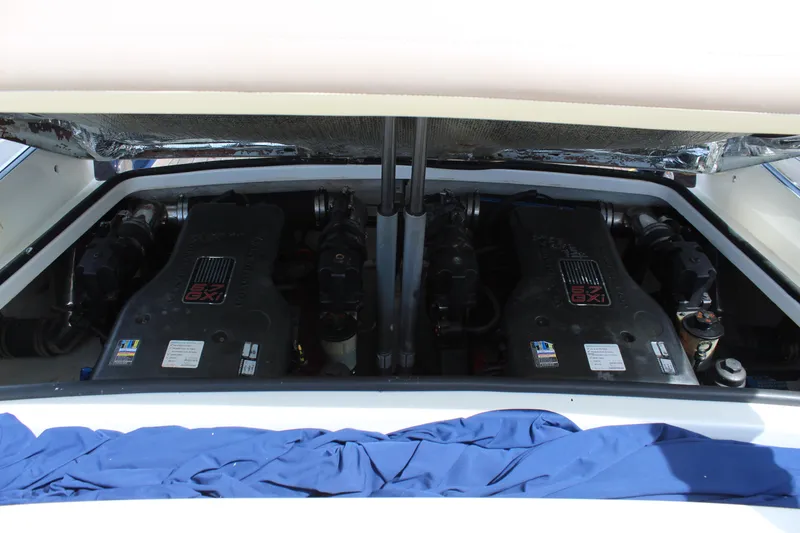 Slide: The Image of Engine compartment of 2010 Chris-Craft Corsair 28 with dual engines. - 20