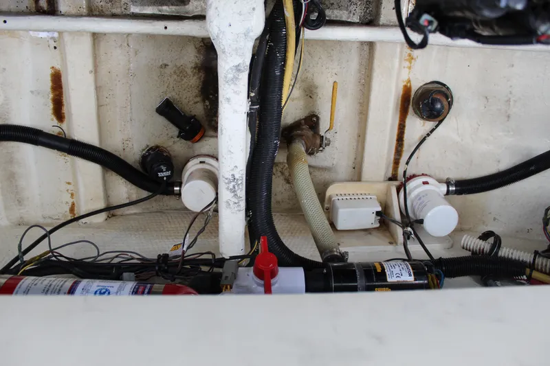 Slide: The Image of Interior view of a 2010 Chris-Craft Corsair 28 boat engine compartment. - 24