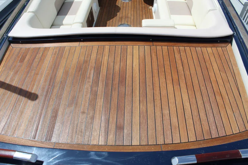 Slide: The Image of Teak deck of a 2010 Chris-Craft Corsair 28 boat. - 4