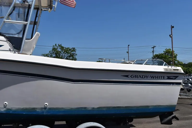 Slide: The Image of 1987 Grady-White Offshore 24 boat on trailer, side view. - 16