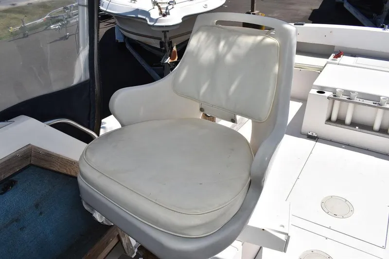 Slide: The Image of 1987 Grady-White Offshore 24 boat seat in white. - 24