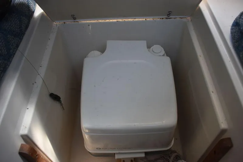 Slide: The Image of Portable toilet in 1987 Grady-White Offshore 24 boat. - 27
