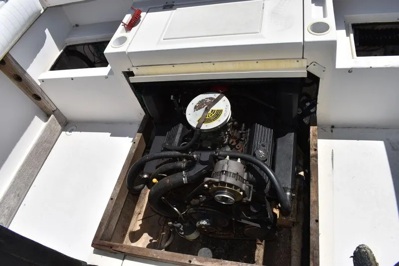 Slide: The Image of 1987 Grady-White Offshore 24 boat engine compartment with visible engine components. - 7