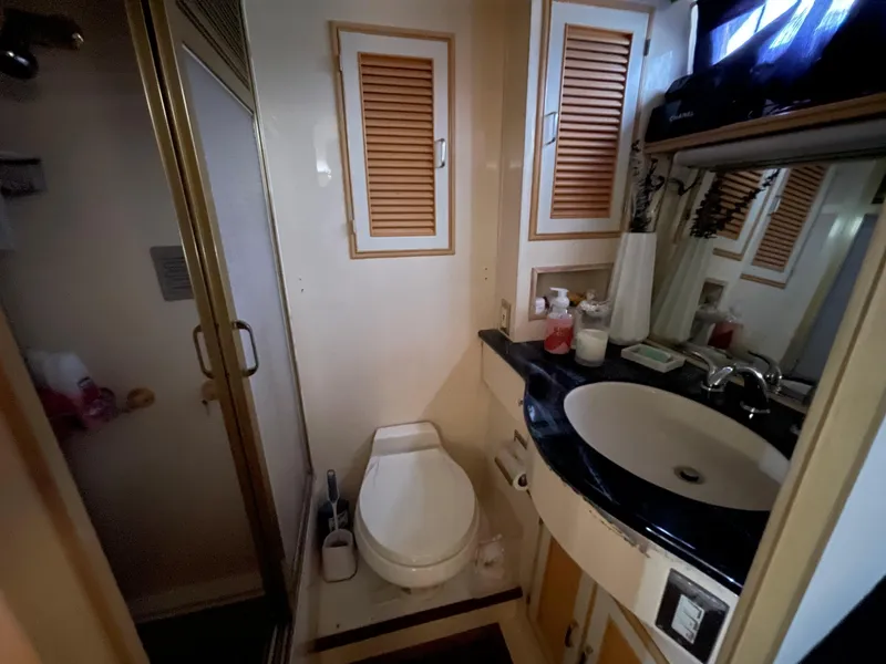 Slide: The Image of Bathroom interior of 1989 Hi-Star 55 Pilothouse yacht with sink and shower. - 7