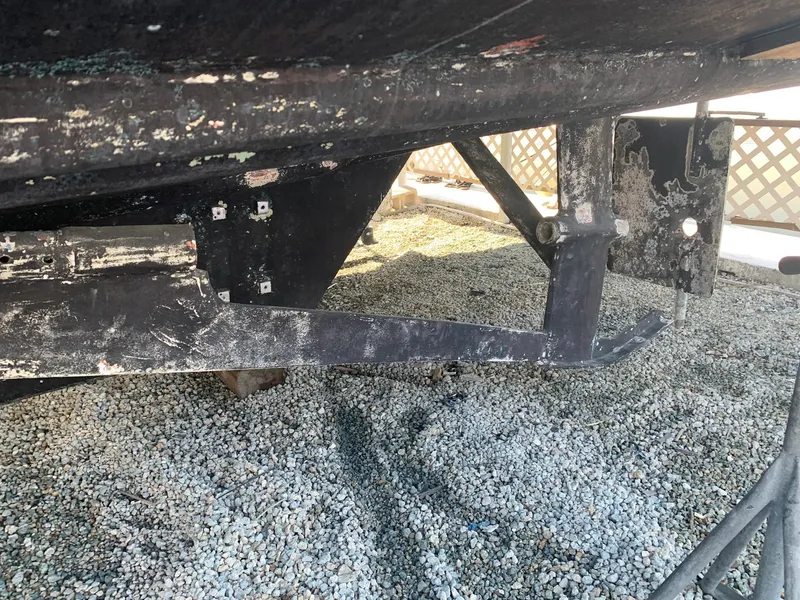 Slide: The Image of 1970 Custom Dive Vessel hull on gravel, showing wear and tear. - 15