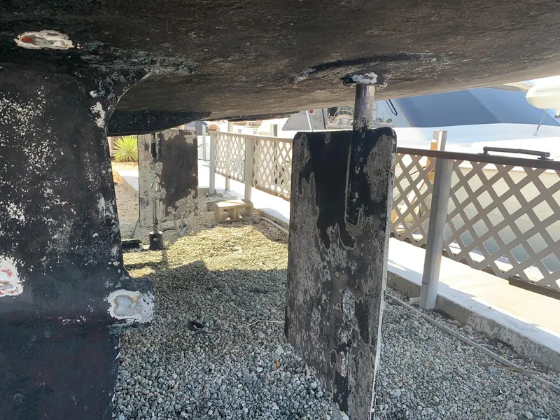 Slide: The Image of Underside of a 1970 Custom Dive Vessel showing rudders and propellers. - 17