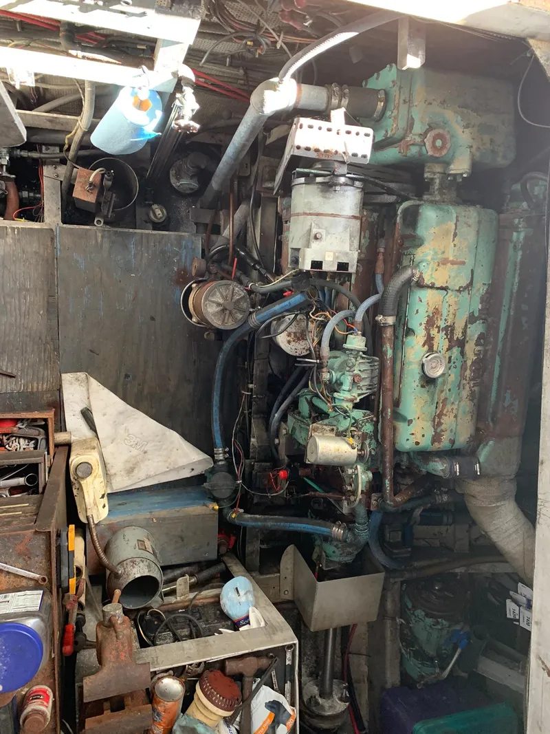 Slide: The Image of Engine room of a 1970 Custom Dive Vessel with vintage machinery and equipment. - 27