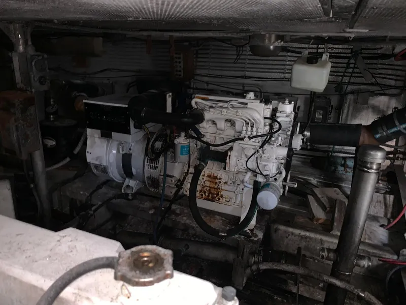 Slide: The Image of Engine room of a 1970 Custom Dive Vessel showing machinery and components. - 37