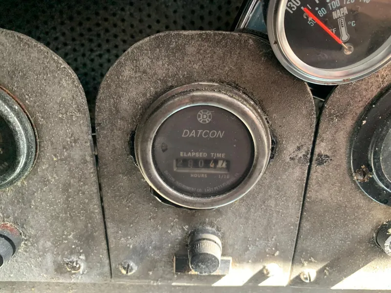 Slide: The Image of Close-up of a Datcon elapsed time gauge on a 1970 custom dive vessel. - 39