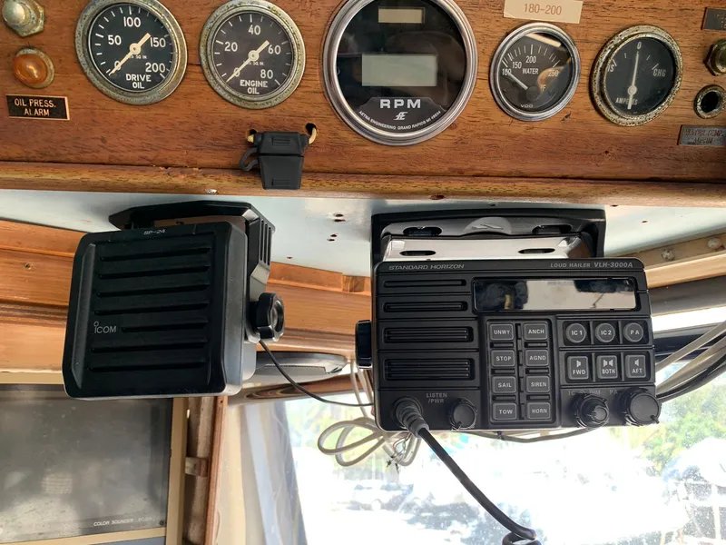 Slide: The Image of Vintage 1970 Custom Dive Vessel dashboard with gauges and communication equipment. - 5