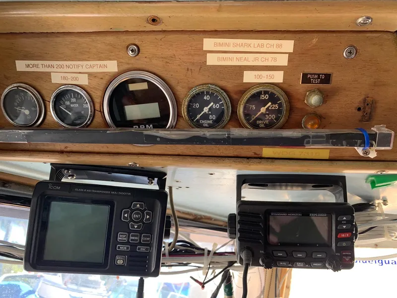 Slide: The Image of Control panel of a 1970 Custom Dive Vessel with gauges and communication devices. - 6