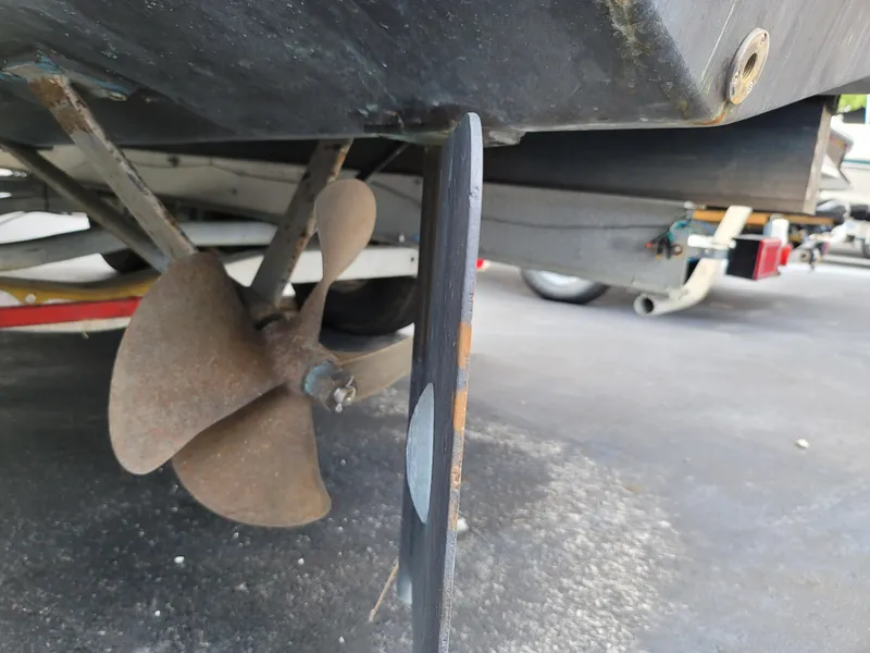 Slide: The Image of Close-up of 1989 C-Hawk 29 boat propeller and rudder. - 12