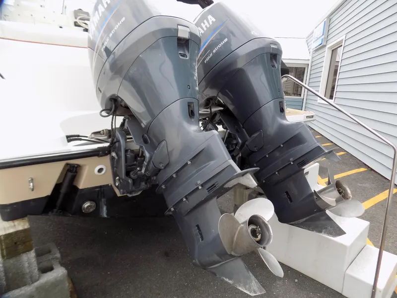 Slide: The Image of Twin Yamaha outboard motors on a 2006 Century 24 Walkaround boat. - 11