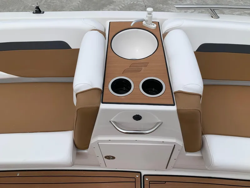 Slide: The Image of 2024 Starcraft SVX 211 boat interior with seating and cup holders. - 8