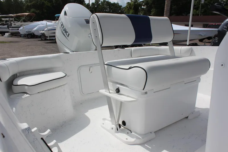 Slide: The Image of 2022 ALK2 Powerboats 18 CRS interior with white and blue seating. - 6