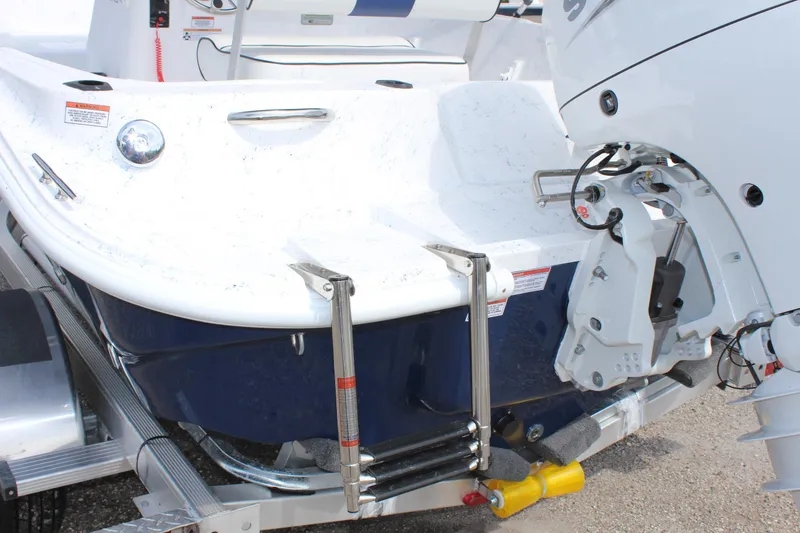 Slide: The Image of 2022 ALK2 Powerboats 18 CRS rear view with motor and ladder. - 7