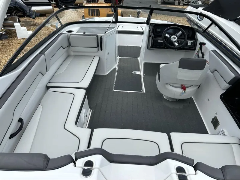 Slide: The Image of 2020 Yamaha Boats AR 190 interior, spacious seating, modern dashboard, and sleek design. - 7