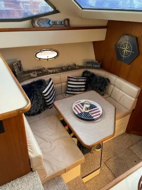 Slide: The Image of Interior cabin of a 1996 Carver 370 yacht with wooden paneling. - 33