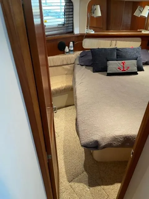 Slide: The Image of Bathroom in a 1996 Carver 370 yacht with shower and sink. - 35