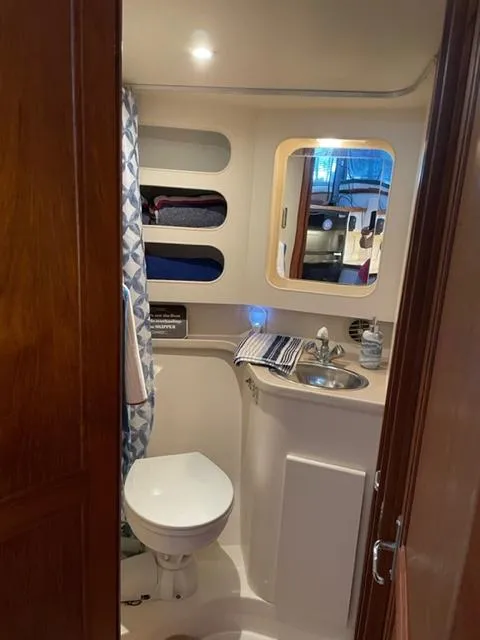 Slide: The Image of Staircase leading to lower cabin in 1996 Carver 370 yacht. - 29