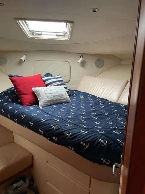 Slide: The Image of Interior cabin of a 1996 Carver 370 yacht with wooden paneling. - 32