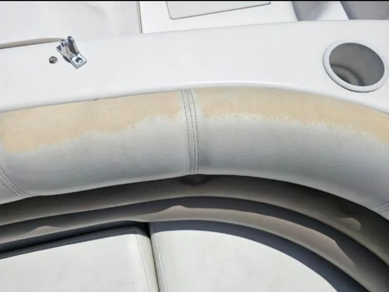 Slide: The Image of Close-up of 2002 Hurricane Fun Deck GS 232 I/O boat seat with discoloration. - 16