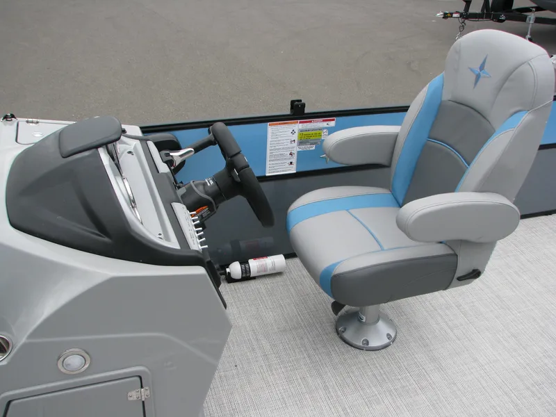 Slide: The Image of Captain's chair and helm of a 2022 Berkshire 24CL2 CTS pontoon boat. - 7